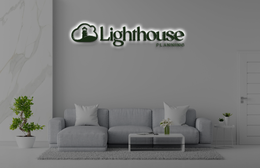 Green illuminated Lighthouse Planning logo above gray sofa in minimalist living room with marble wall and bonsai.