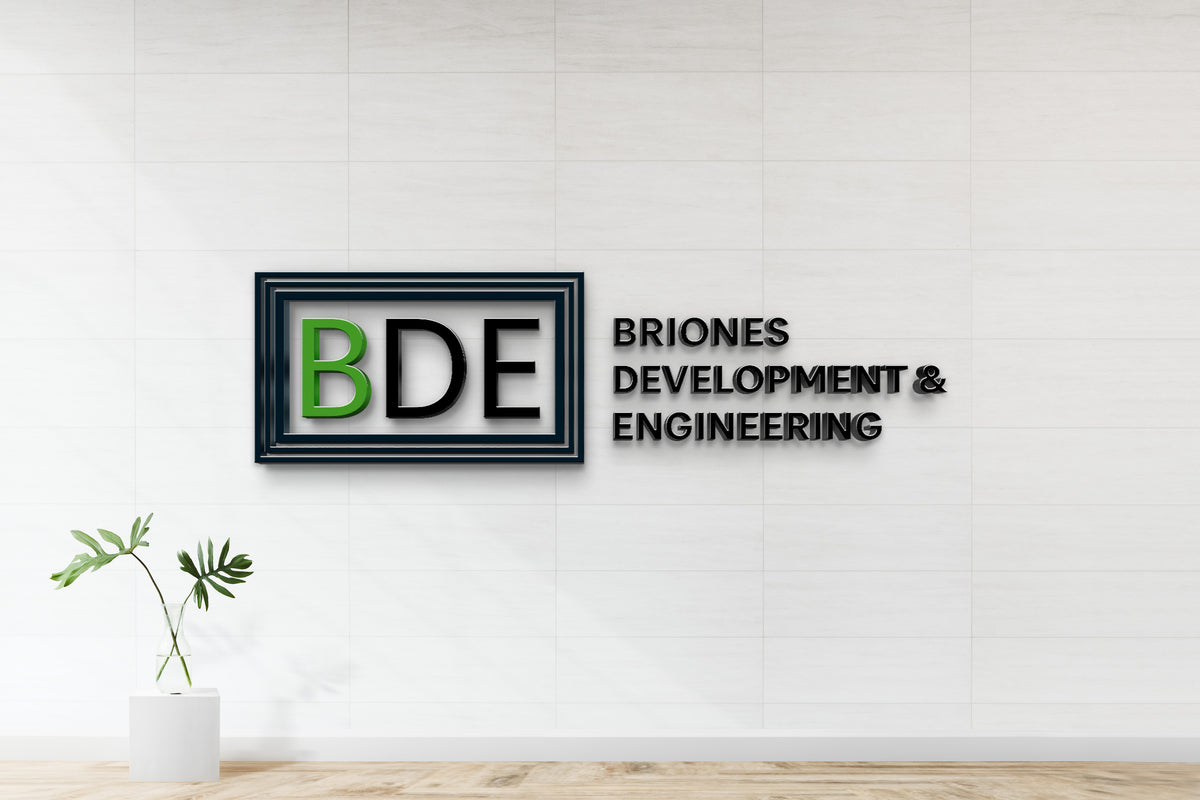 BDE logo: green B and black DE in layered blue frame with 3D BRIONES DEVELOPMENT & ENGINEERING text on white tiled wall.