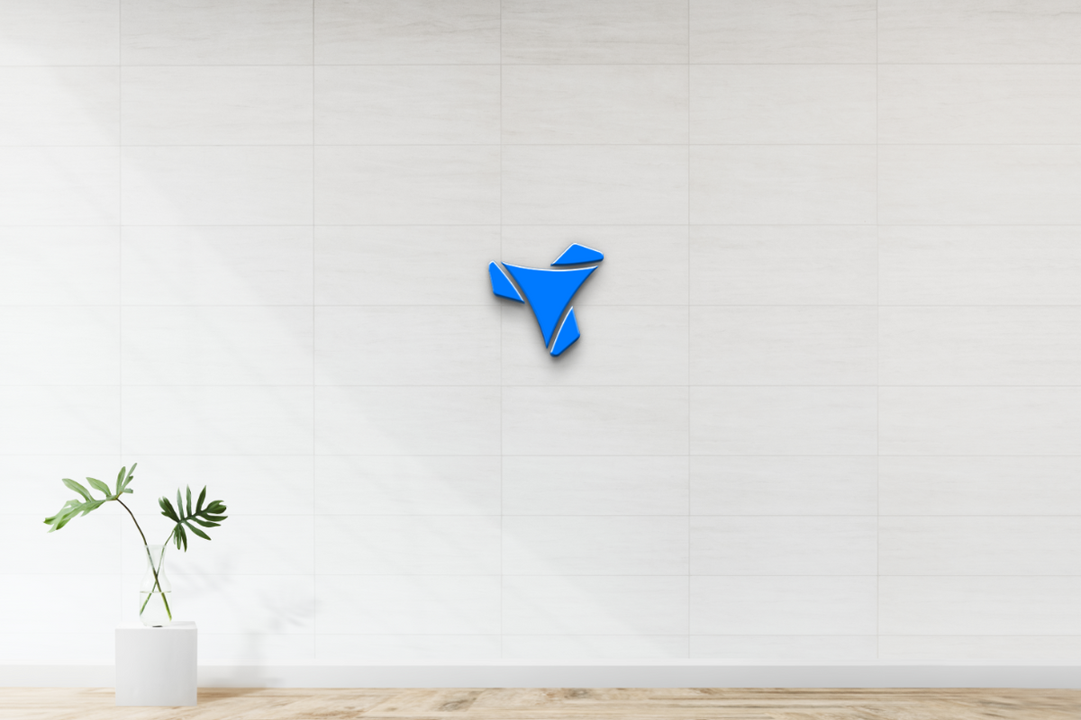 Blue three-point geometric logo on white tiled wall with glass vase of green leaves on white pedestal.