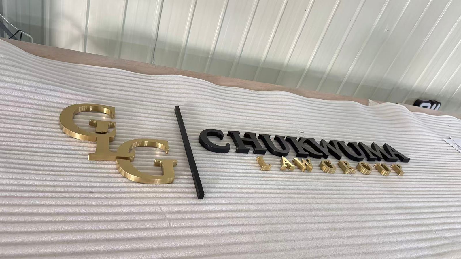 Installation Of Metal Sign For Caesar