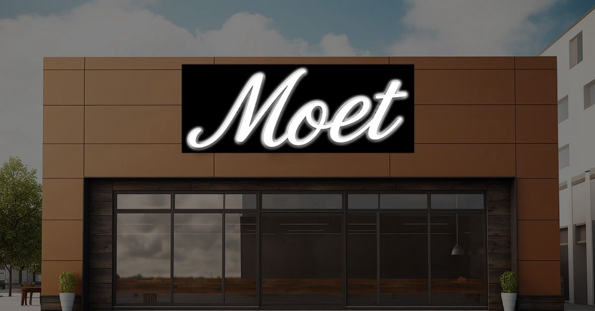 Moet bar storefront LED neon sign variant with white script wordmark on single black panel, exterior cocktail lounge signage.