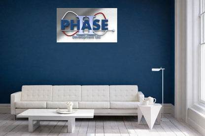 Phase II Development LLC full-color printed metal logo sign mounted on navy wall above white lounge sofa, business office interior mockup.