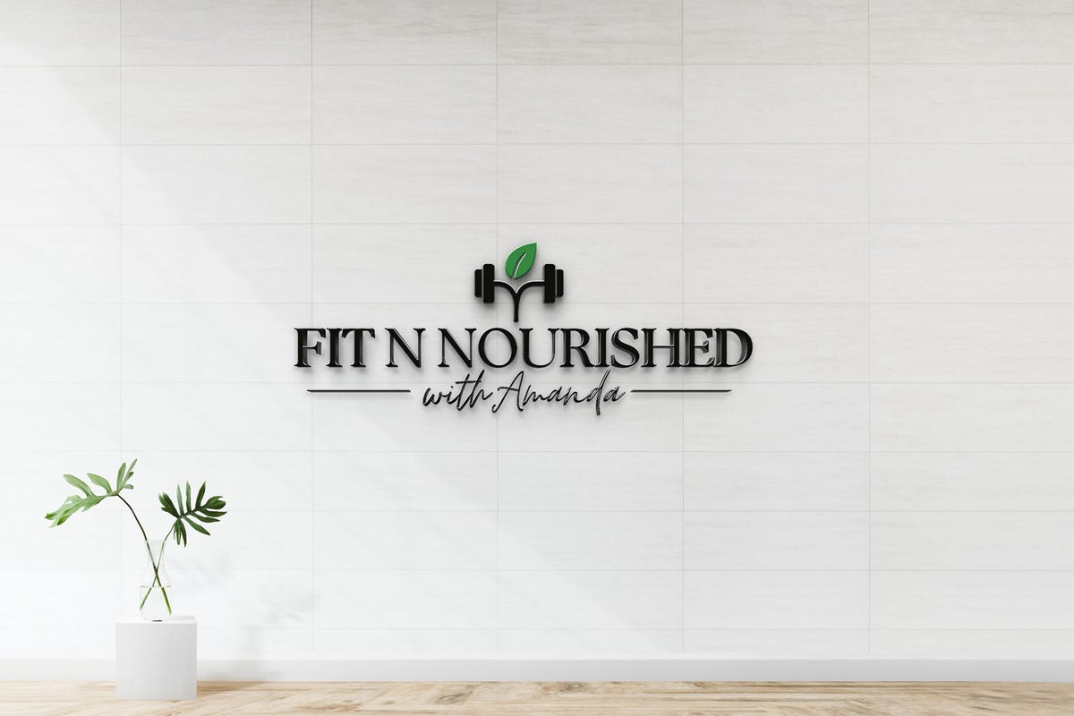 Black 3D "FIT N NOURISHED with Amanda" logo with dumbbell icon and green leaf on white tiled wall above glass-vase.