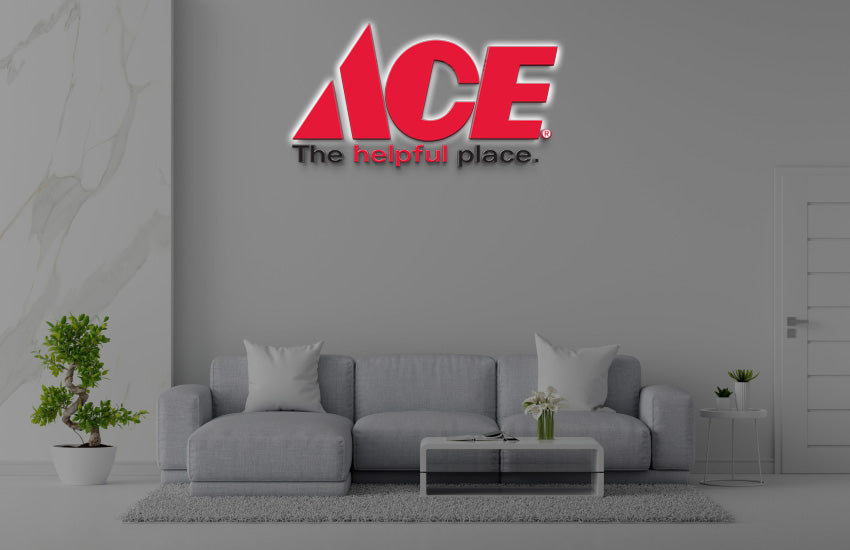 Ace Hardware The Helpful Place 3D halo backlit logo sign with red wedge mark and tagline on office wall mockup.