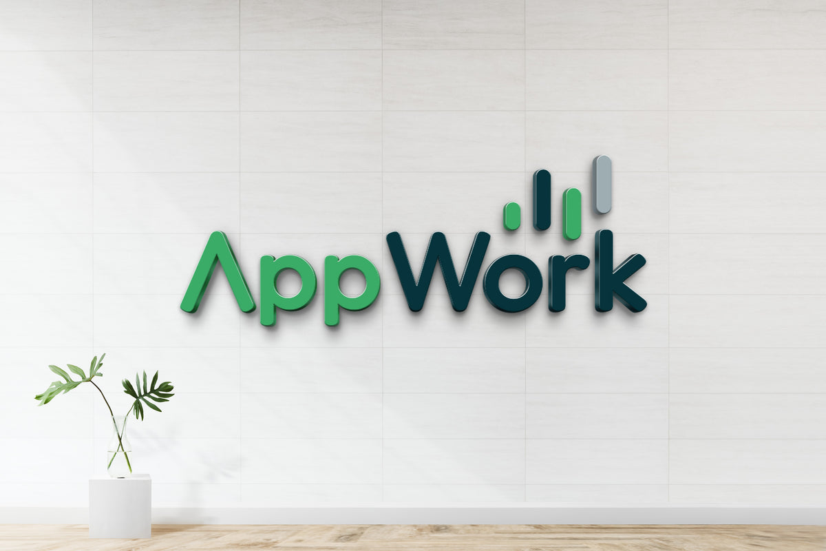 AppWork 3D logo in green and dark teal with three vertical bars on a white tiled wall above glass vase and wooden floor.