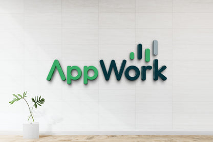 AppWork 3D logo in green and dark teal with three vertical bars on a white tiled wall above glass vase and wooden floor.