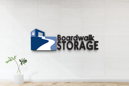Boardwalk STORAGE logo with blue storage-unit icon showing padlock and white winding boardwalk on white tiled wall.