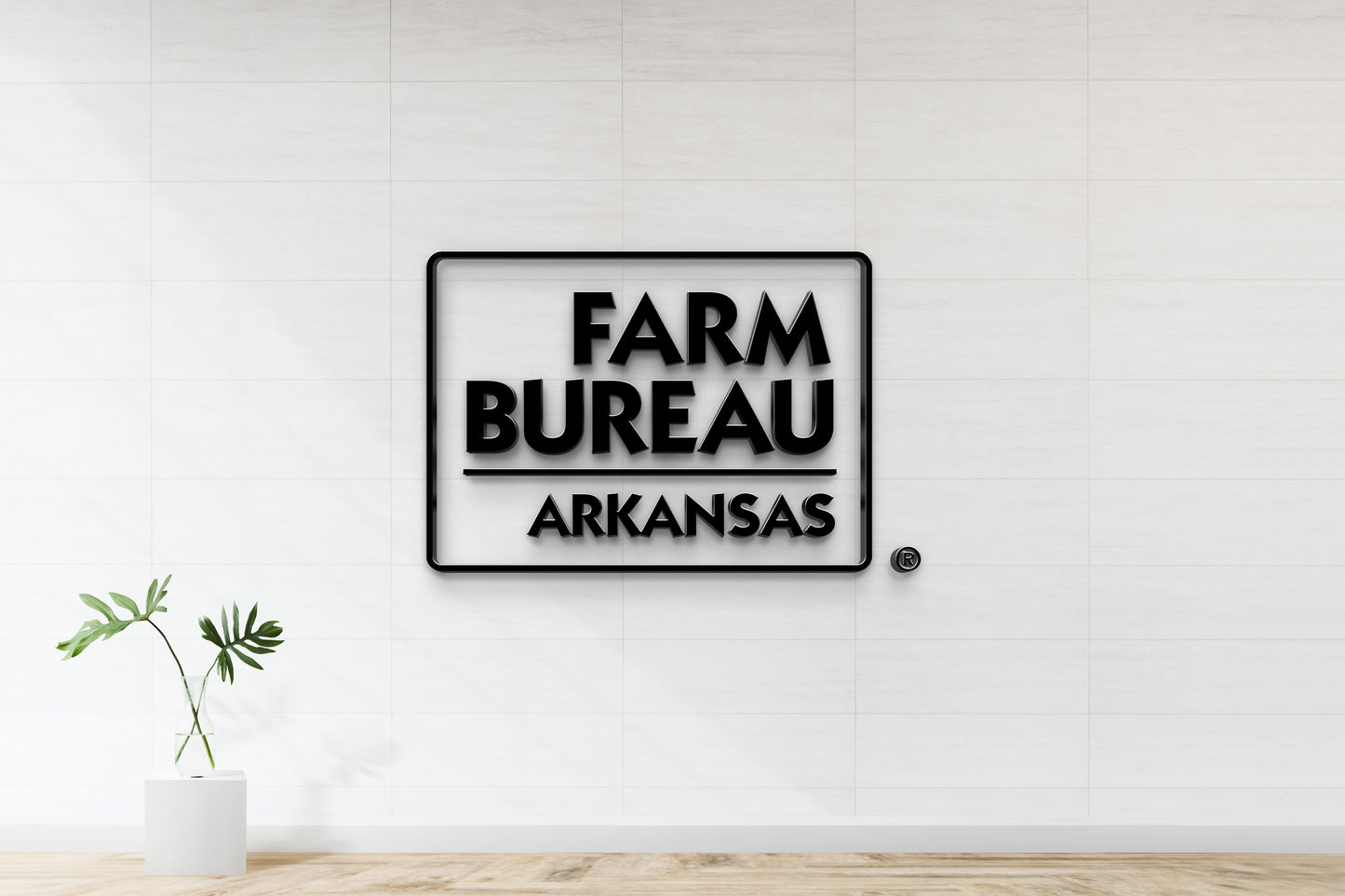 Farm Bureau Arkansas 3D logo sign mockup with rounded rectangle border, nonlit dimensional letters on office wall with elegant tile finish.
