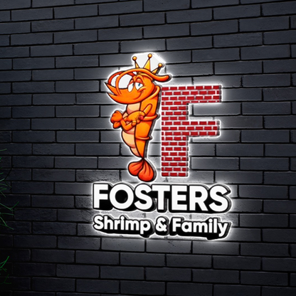 Volt Signs mounted a glowing custom sign of a crowned shrimp and brick F for Fosters Shrimp & Family signage