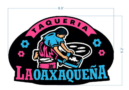 Taqueria La Oaxaqueña logo showing a woman in blue blouse and pink skirt pressing masa, cyan and pink text on black.