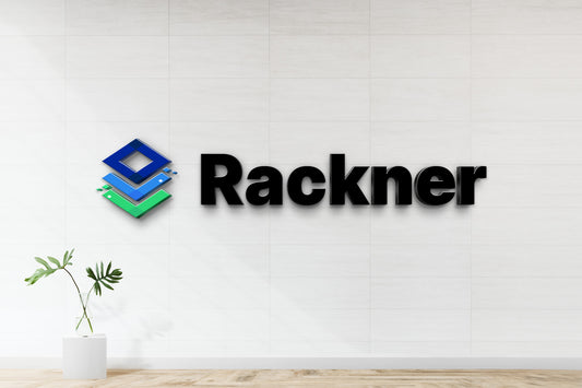 3D non-lit custom wall sign mockup for Rackner featuring black letters and blue-green geometric logo on white tile wall