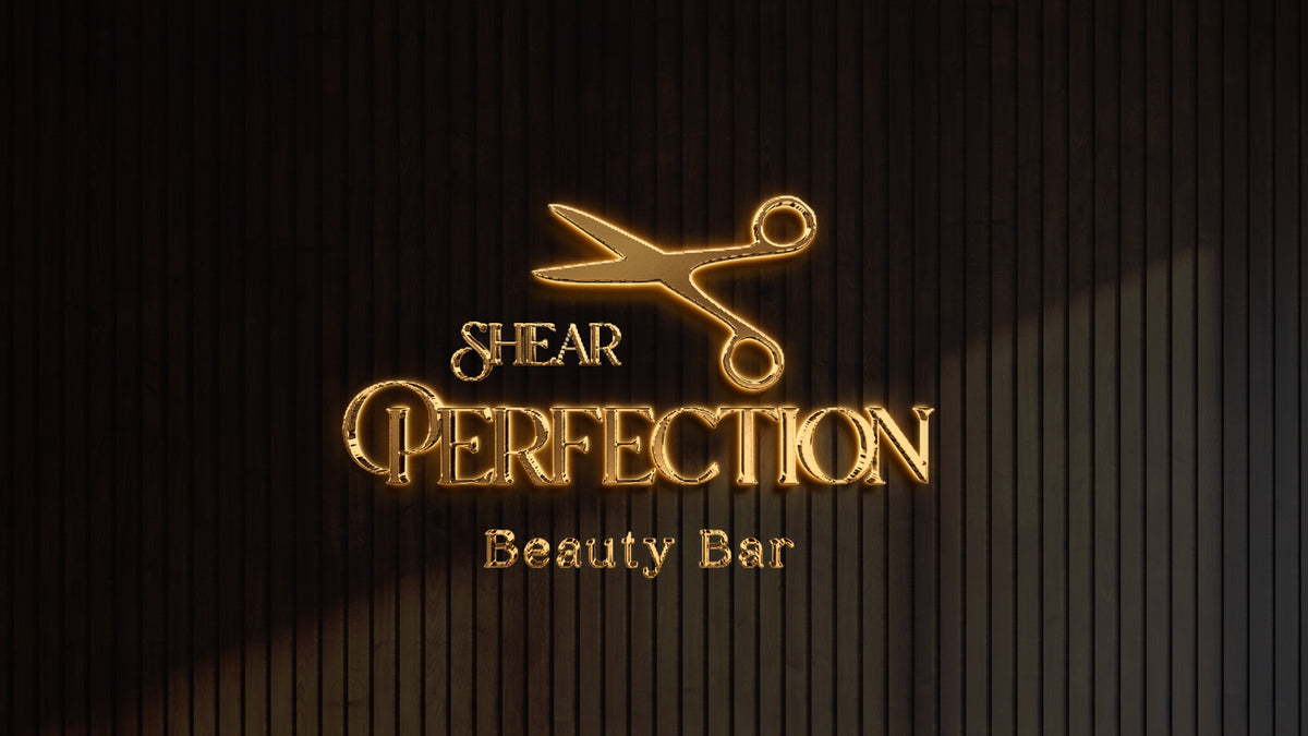 Gold neon scissor logo and glowing text 'SHEAR PERFECTION Beauty Bar' on dark vertical wooden slat wall.