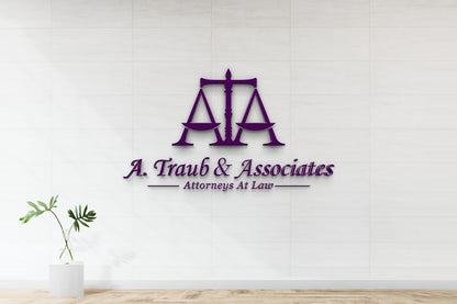 Purple scales logo above 'A. Traub & Associates Attorneys At Law' text on white tiled wall with glass vase plant.