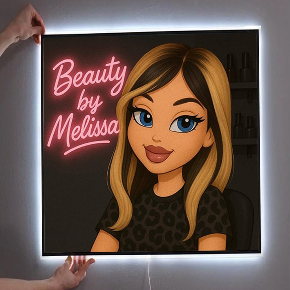 LED-backlit square sign reading neon pink 'Beauty by Melissa' beside cartoon blonde with blue eyes, hands adjust frame.