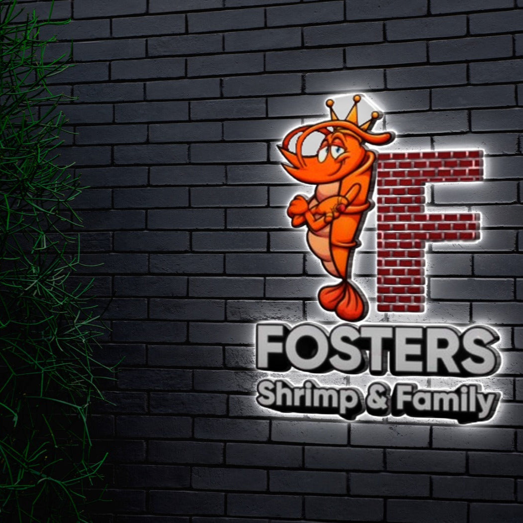 A Volt Signs custom sign features a crowned shrimp beside a brick F and FOSTERS Shrimp & Family on a dark brick wall