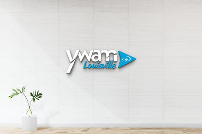 White 3D YWAM logo with turquoise play-triangle and blue cursive 'Louisville' on tiled white wall.
