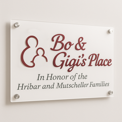 Acrylic plaque with maroon 'Bo & Gigi's Place', family silhouette and gray text honoring Hribar and Mutscheller.