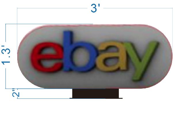 Oval white sign showing the eBay logo in red, blue, yellow and green with dimension markings 3' by 1.3' on a black base.