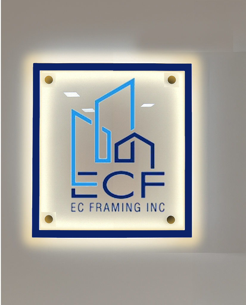 Backlit square wall sign with blue border, gold corner mounts, blue building outline, 'ECF' initials and EC FRAMING INC.