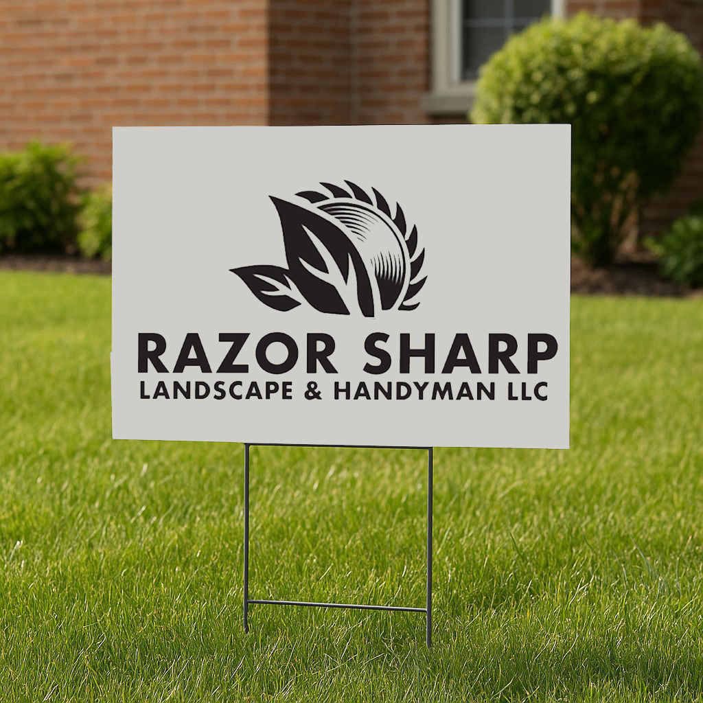 A white yard sign in green grass displays RAZOR SHARP LANDSCAPE & HANDYMAN LLC with a black leaf and saw logo.